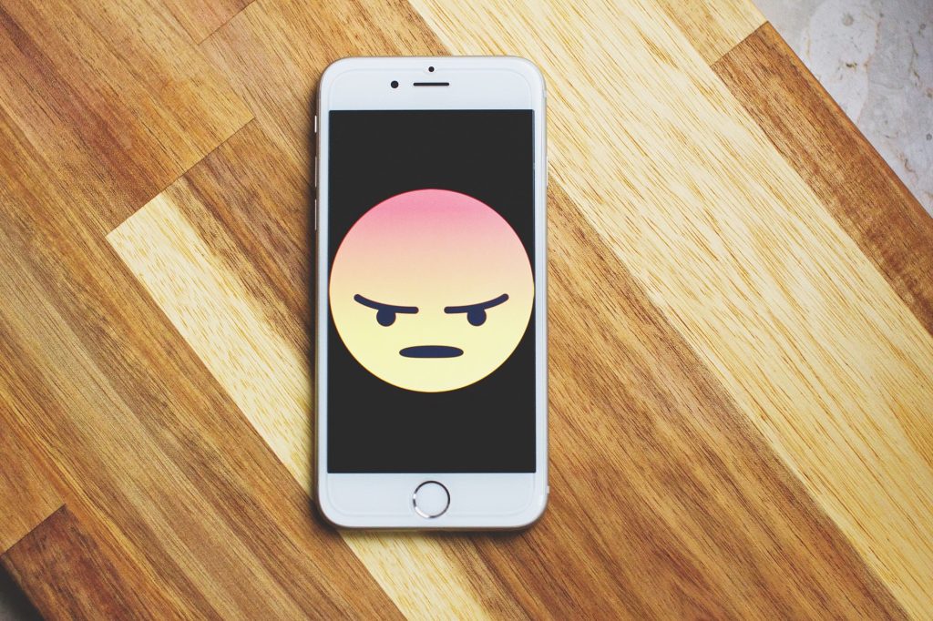 Angry emoji on a phone